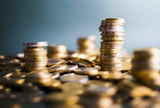 Coin stacks Euro coin stacks isolated in studio shot. Money and finance concept